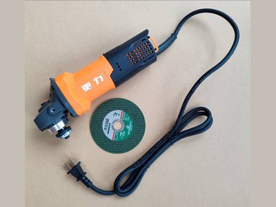 Hand-held grinder